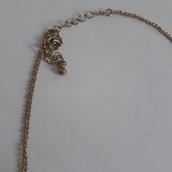 Blue and Cream Bird Necklace on a Long Gold Chain - Picture 3 of 3